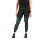 Made in USA 7/8 Green and Black Aspen Leggings. Crafted with care from a premium blend of materials. With a mid to high-rise waist, they provide just the right amount of coverage and support. The 7/8 length design adds a trendy touch to your look. These leggings feature a green and black scheme graphic pine tree pattern. Model Fit Video.