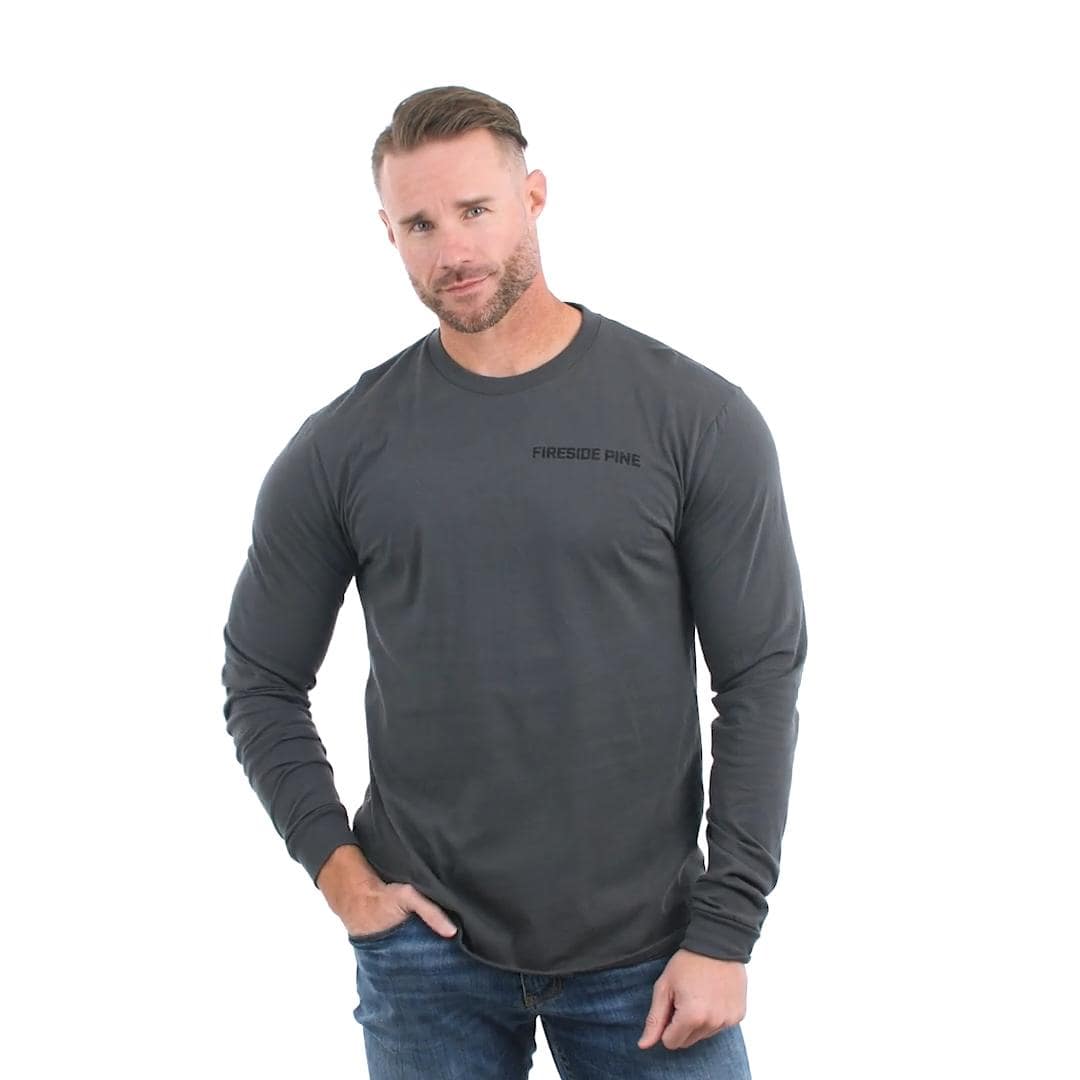 Made in the USA. Eco-friendly Organic Cotton Long Sleeve Shirt. Featuring a large, full color Fireside Pine Flag Mountain logo on the back and a small wordmark logo on the chest. Model Fit Video.