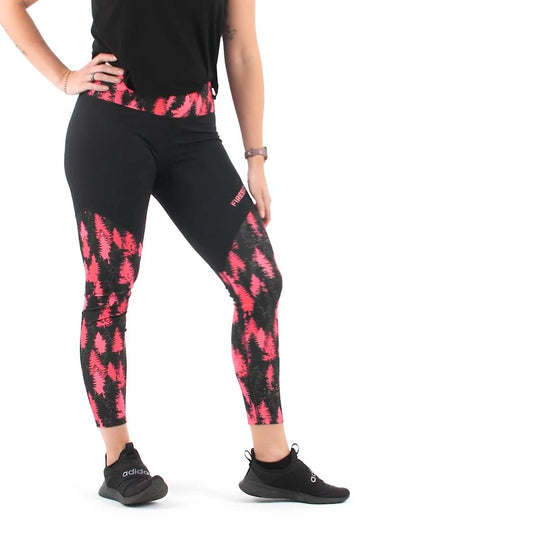 Crafted with care from a premium blend of materials. With a mid to high-rise waist, they provide just the right amount of coverage and support. The 7/8 length design adds a trendy touch to your look. These leggings feature a hot pink color scheme graphic pine tree pattern. Model Fit Video.